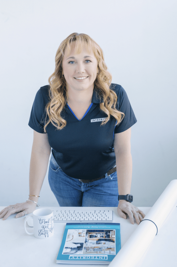 Headshot of Heidi, an Integrity team member, smiling in professional portrait photo.
